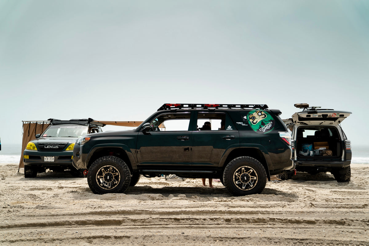 Crown Offroad vehicles on a beach trip